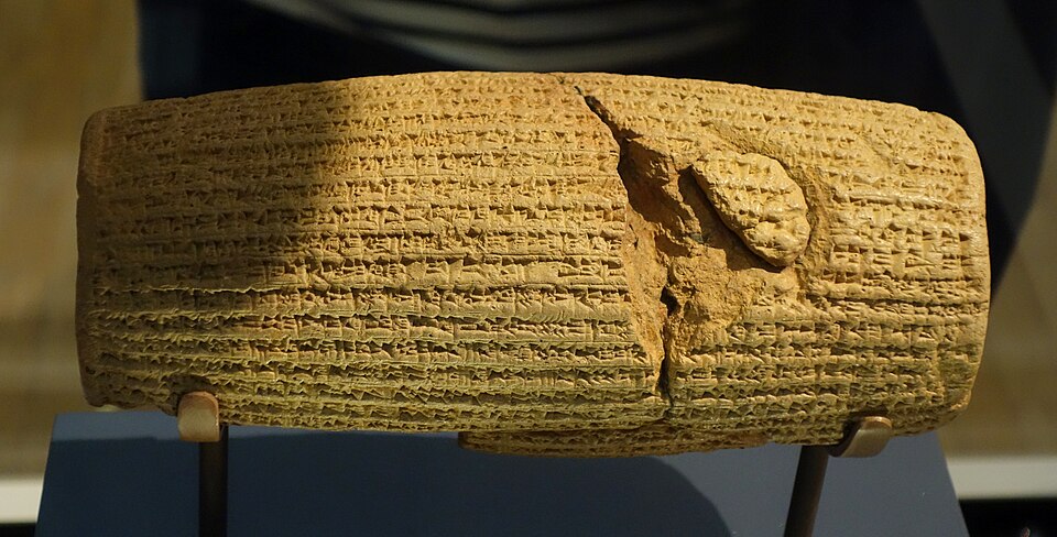 The Cyrus Cylinder, a clay barrel inscribed in Akkadian cuneiform, British Museum