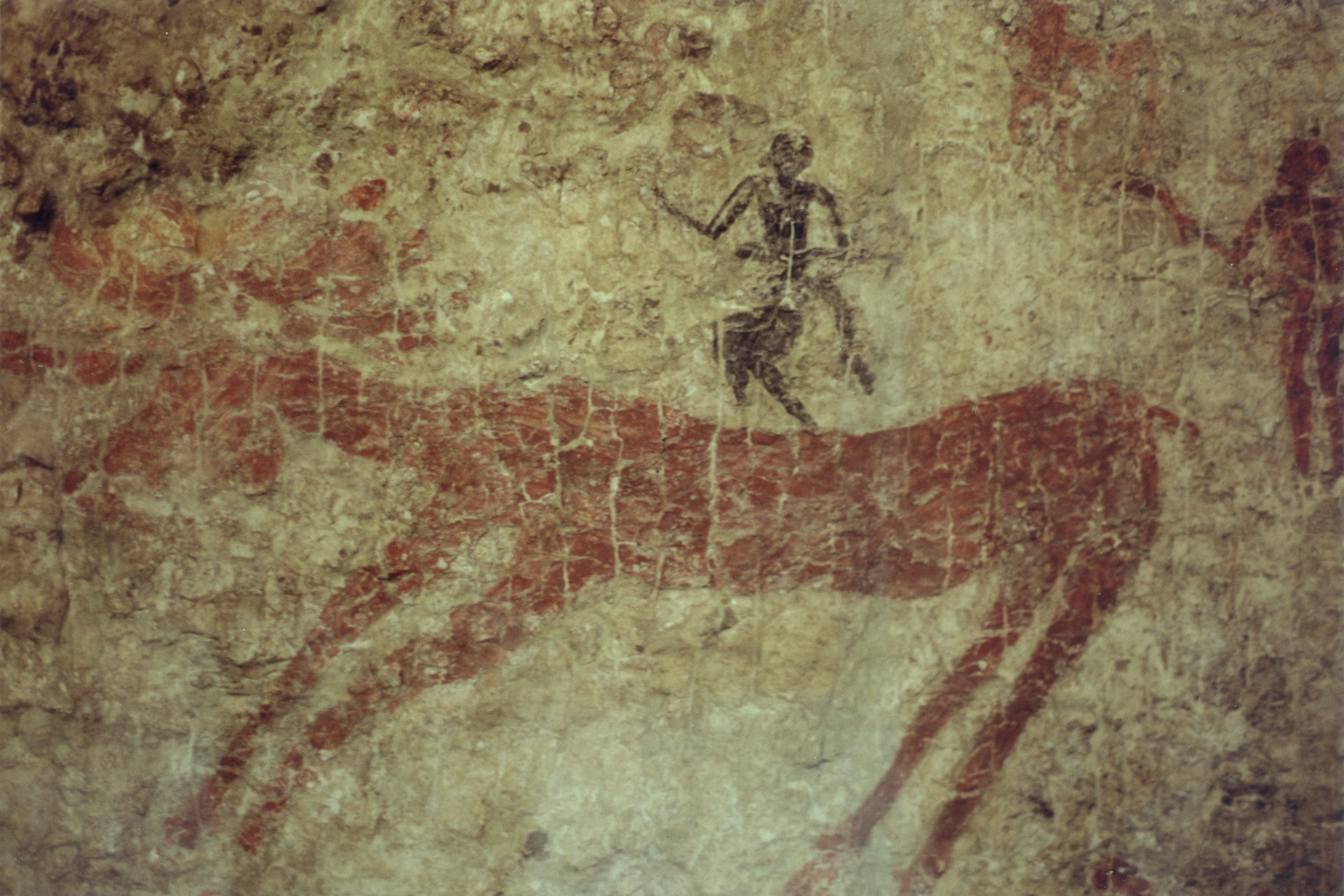 Neolithic wall painting from Catalhoyuk depicting a hunting scene with deer, displayed at the Museum of Anatolian Civilizations in Ankara