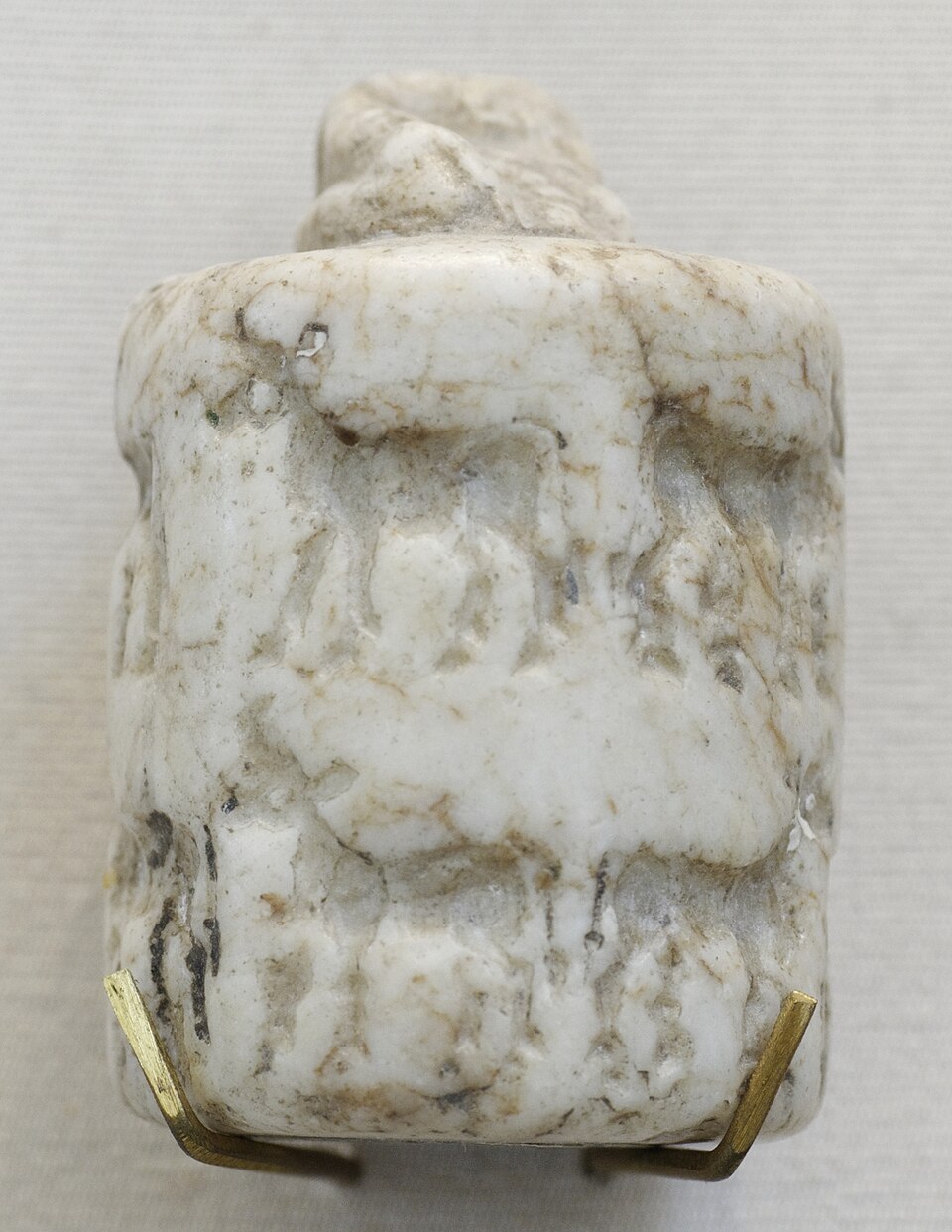 Uruk period cylinder seal impression showing a cowshed with calves and milk jars, Louvre Museum