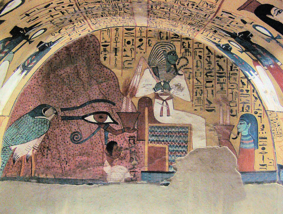 Well-preserved painted hieroglyphic inscriptions inside Tomb TT3 of Pashedu at Deir el-Medina, showing the god Osiris with the Mountains of the West