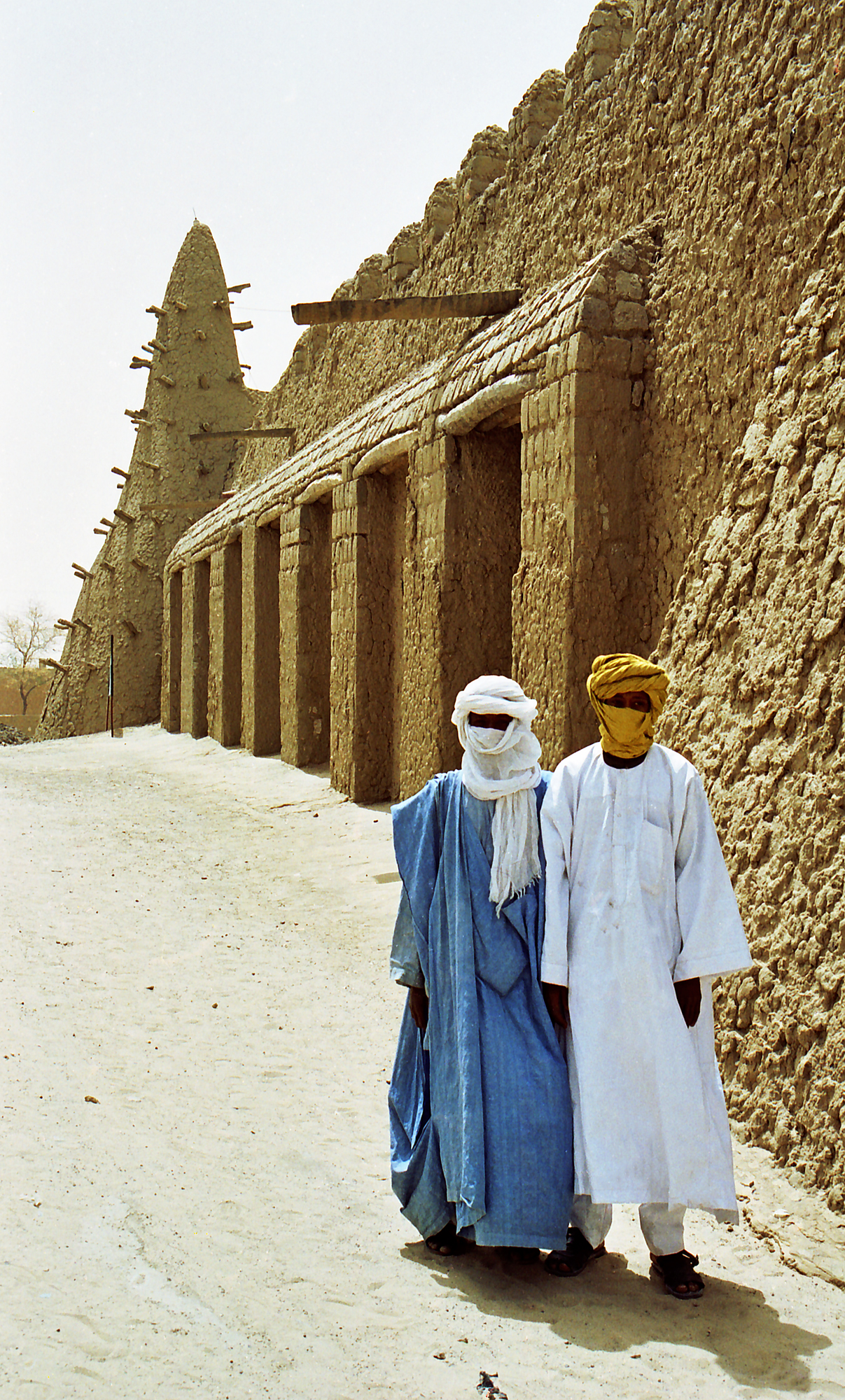 The Djinguereber Mosque in Timbuktu, a large mudbrick structure with distinctive protruding wooden beams