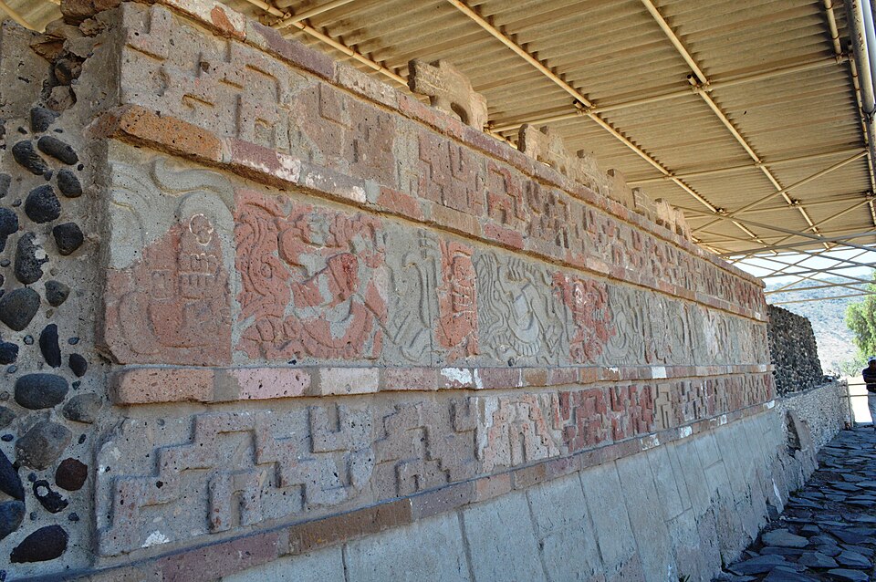 The Coatepantli serpent wall at Tula, Hidalgo, showing carved panels of serpents devouring skeletal human figures