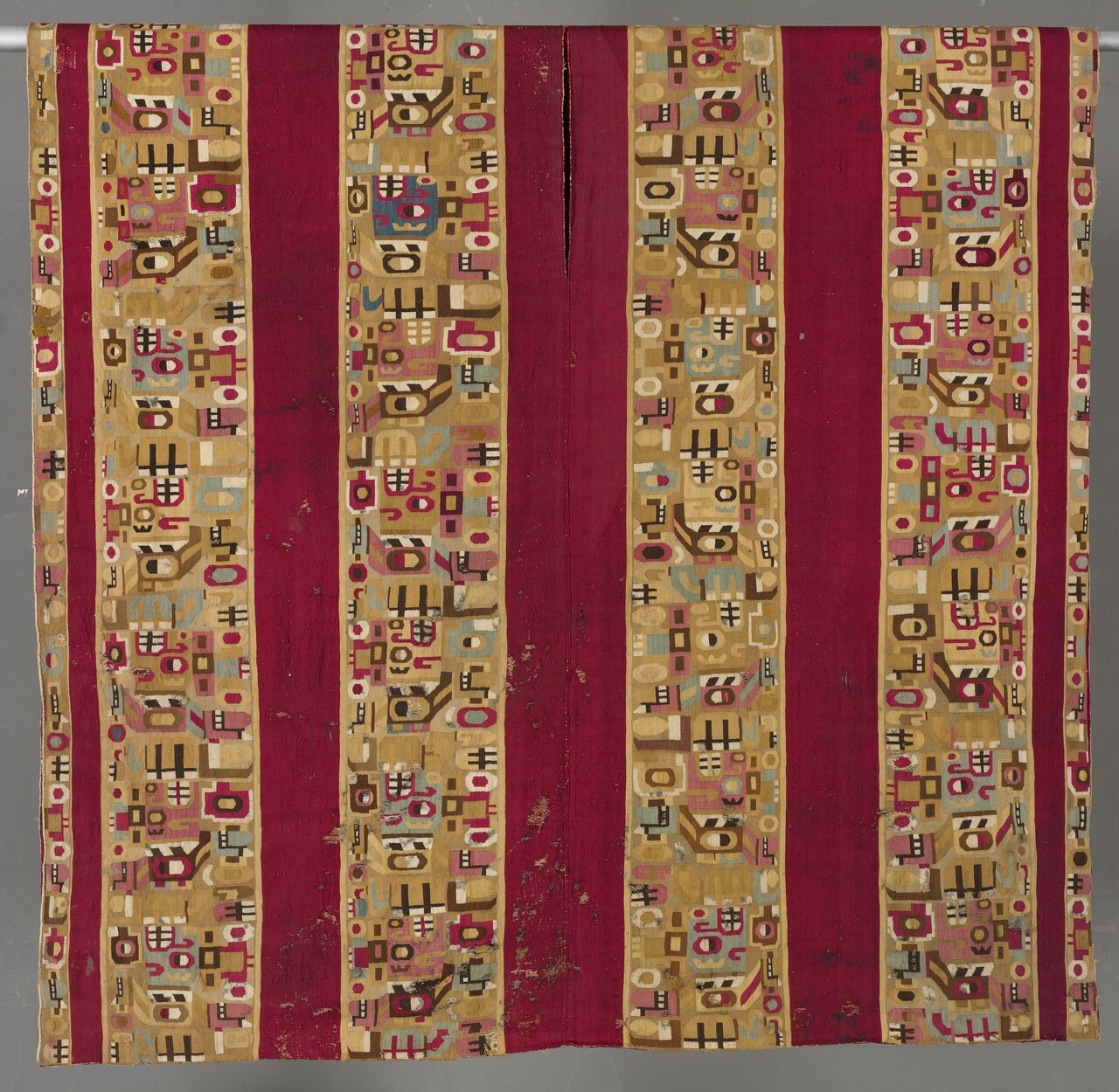 A colourful Wari textile tunic with geometric patterns from pre-Columbian Peru