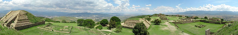 Panoramic view of Monte Albán's Main Plaza from the northern platform, showing the major structures arranged around the levelled mountaintop