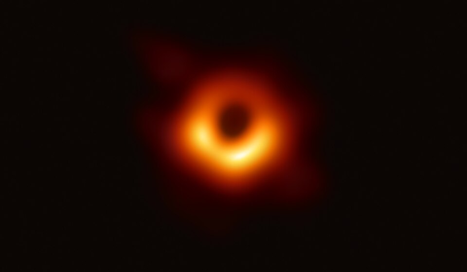 First image of a black hole showing the glowing accretion ring and central shadow of M87*