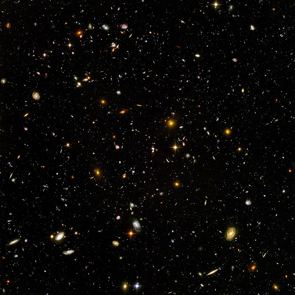 Hubble Ultra Deep Field image showing thousands of galaxies at various distances and ages