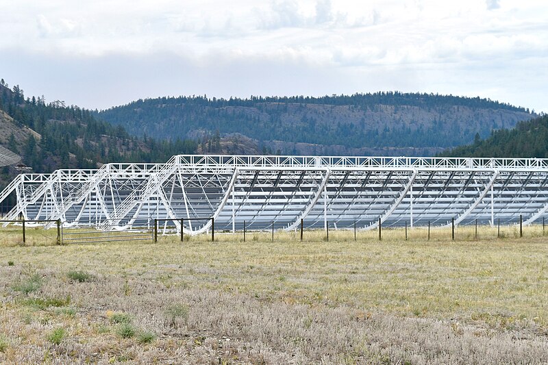 The Canadian Hydrogen Intensity Mapping Experiment (CHIME) radio telescope in British Columbia, consisting of four large semi-cylindrical reflectors
