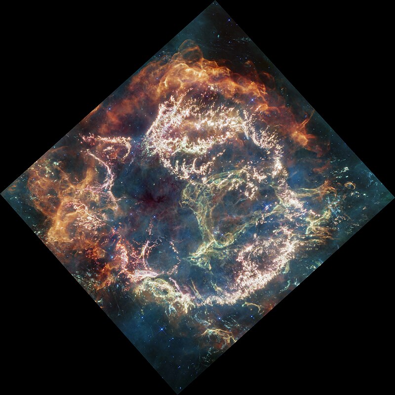 James Webb Space Telescope MIRI image of supernova remnant Cassiopeia A, showing intricate filaments of ejected stellar material