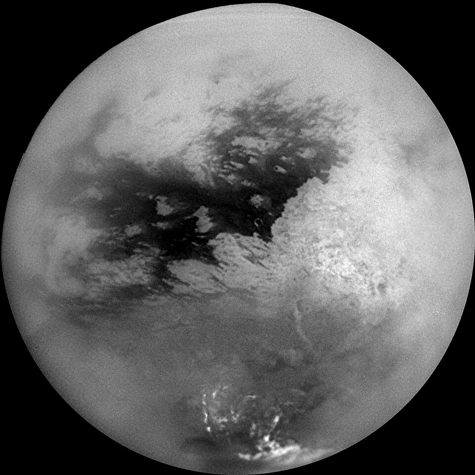 Natural-colour globe view of Saturn's moon Titan showing its thick orange atmospheric haze