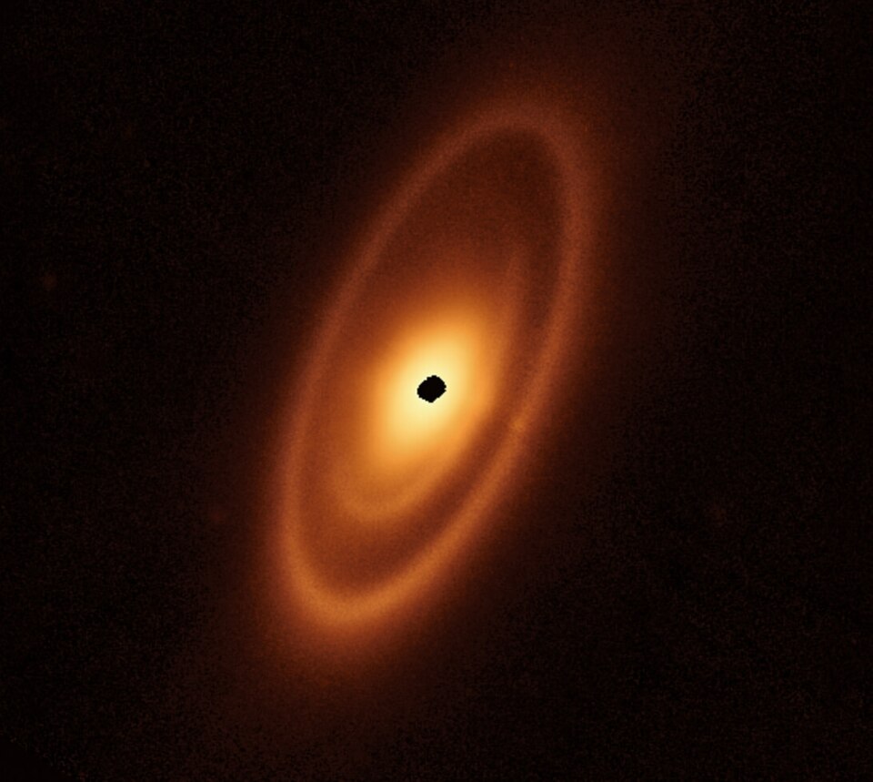 James Webb Space Telescope mid-infrared image of concentric dust rings forming the debris disk around the star Fomalhaut