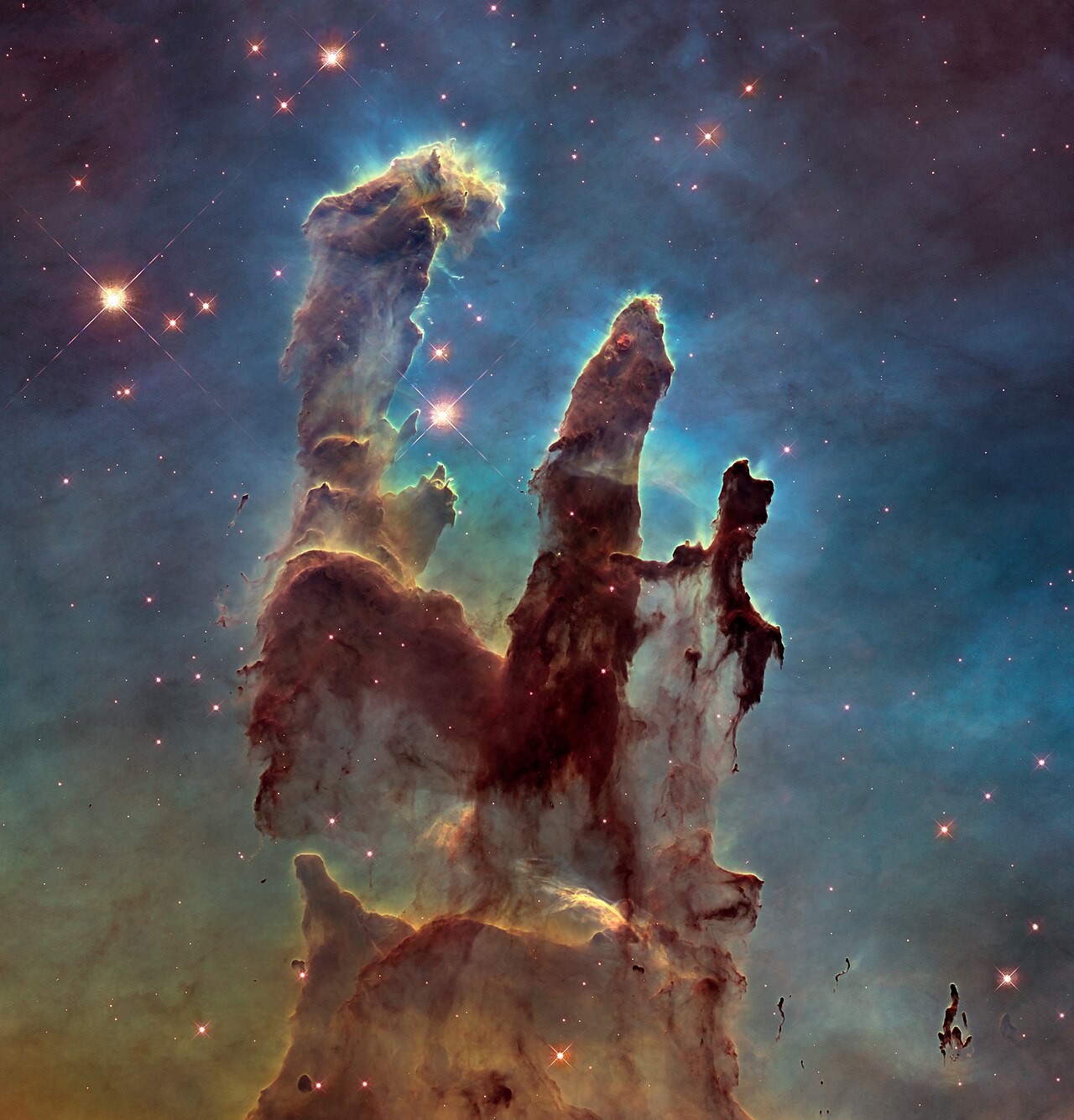 NASA's Hubble Space Telescope has revisited the famous Pillars of Creation, originally photographed in 1995, revealing a sharper and wider view of the
