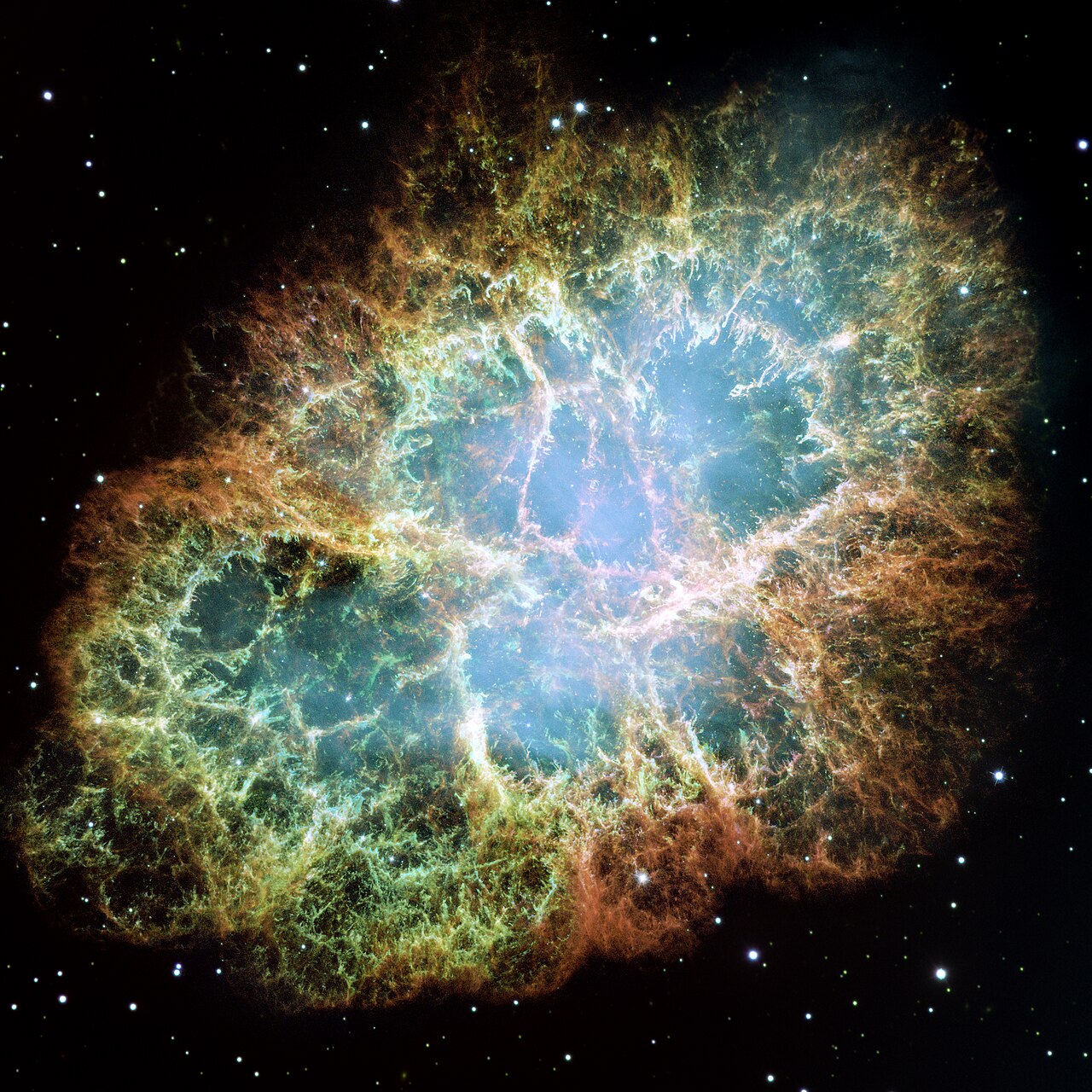 This is a mosaic image, one of the largest ever taken by NASA's Hubble Space Telescope, of the Crab Nebula, a six-light-year-wide expanding remnant of