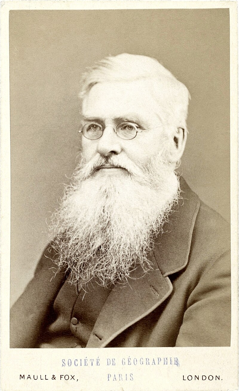 Portrait photograph of Alfred Russel Wallace, co-discoverer of evolution by natural selection, taken by Maull and Fox around 1869