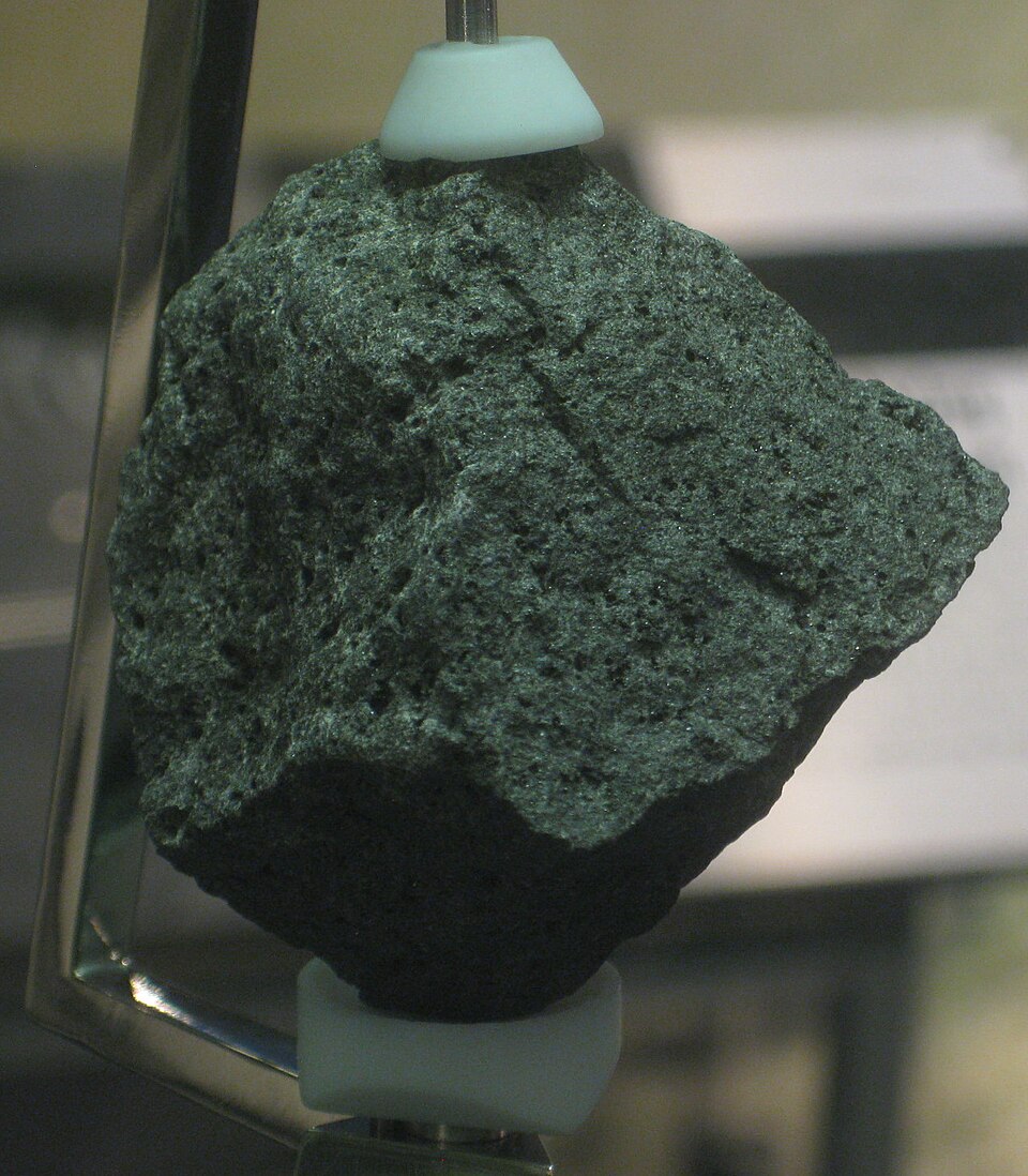Apollo lunar rock sample 10017, a dark basalt specimen collected during the Apollo 11 mission, displayed at the Armstrong Air and Space Museum