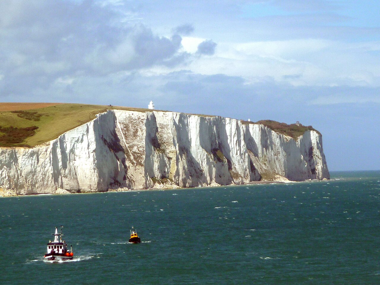 The White Cliffs of Dover showing massive chalk deposits formed from microscopic marine organisms