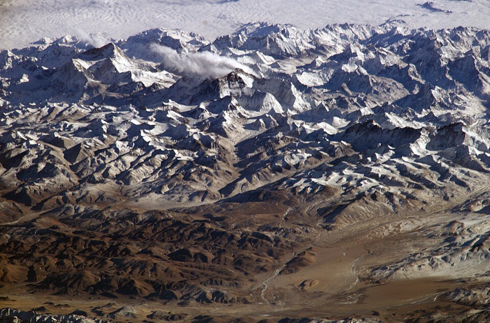 NASA satellite image of the Himalaya mountain range showing snow-capped peaks and deep valleys