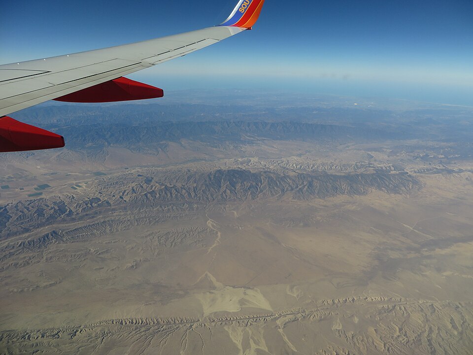 Aerial photograph of the San Andreas Fault cutting across the Carrizo Plain in California, showing the linear trace of the fault displacing the landscape