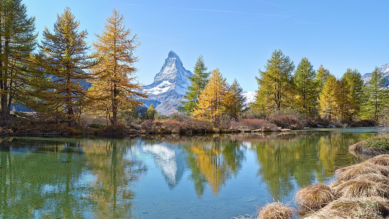 The Matterhorn reflected in Grindjisee lake near Zermatt, Switzerland, showing the dramatic folded and thrust rock formations of the Alps