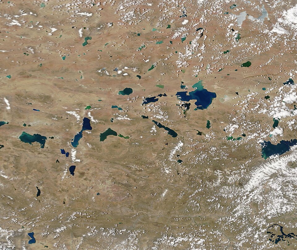 MODIS satellite image of the Tibetan Plateau showing the vast, arid high-altitude landscape with numerous lakes