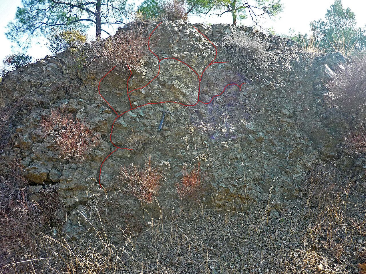 Pillow lava formations from the Troodos Ophiolite in Cyprus, showing rounded pillow-shaped structures characteristic of underwater volcanic eruption