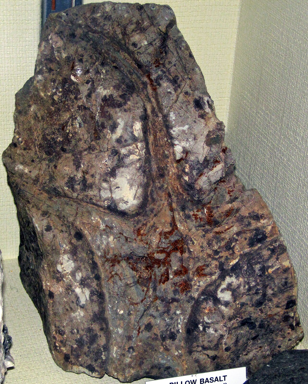 Rounded pillow-shaped lava formations indicating underwater volcanic eruption
