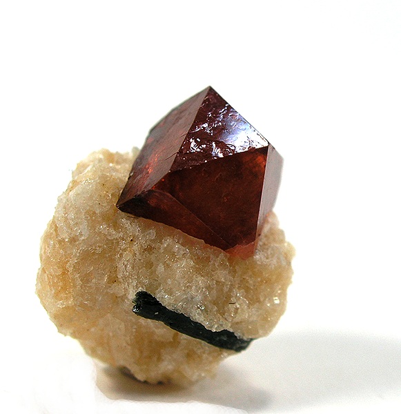 Prismatic zircon crystal specimen displaying characteristic tetragonal form