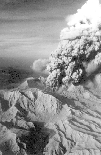 A vertical eruption column rising from Mount Pinatubo during the 1991 eruption sequence