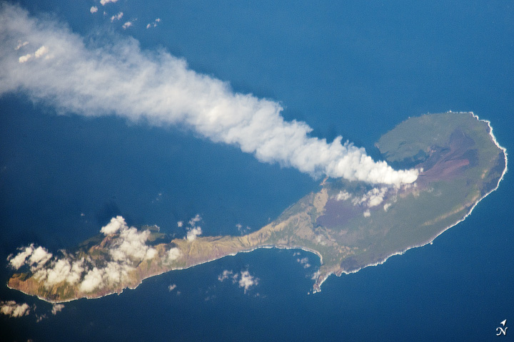 A chain of volcanic islands forming an island arc above a subduction zone in the Pacific Ocean