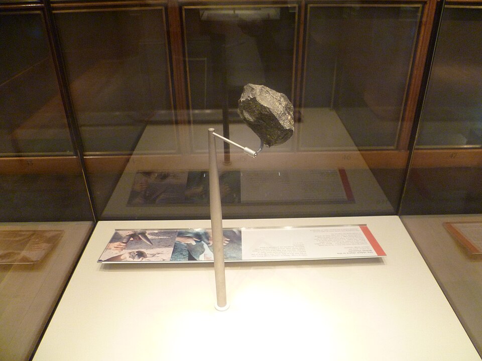 Oldowan stone chopping tool from Olduvai Gorge, approximately 1.8 million years old, used for processing animal carcasses