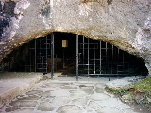 The entrance to Bacho Kiro Cave in Bulgaria, a key archaeological site yielding some of the earliest modern human remains in Europe