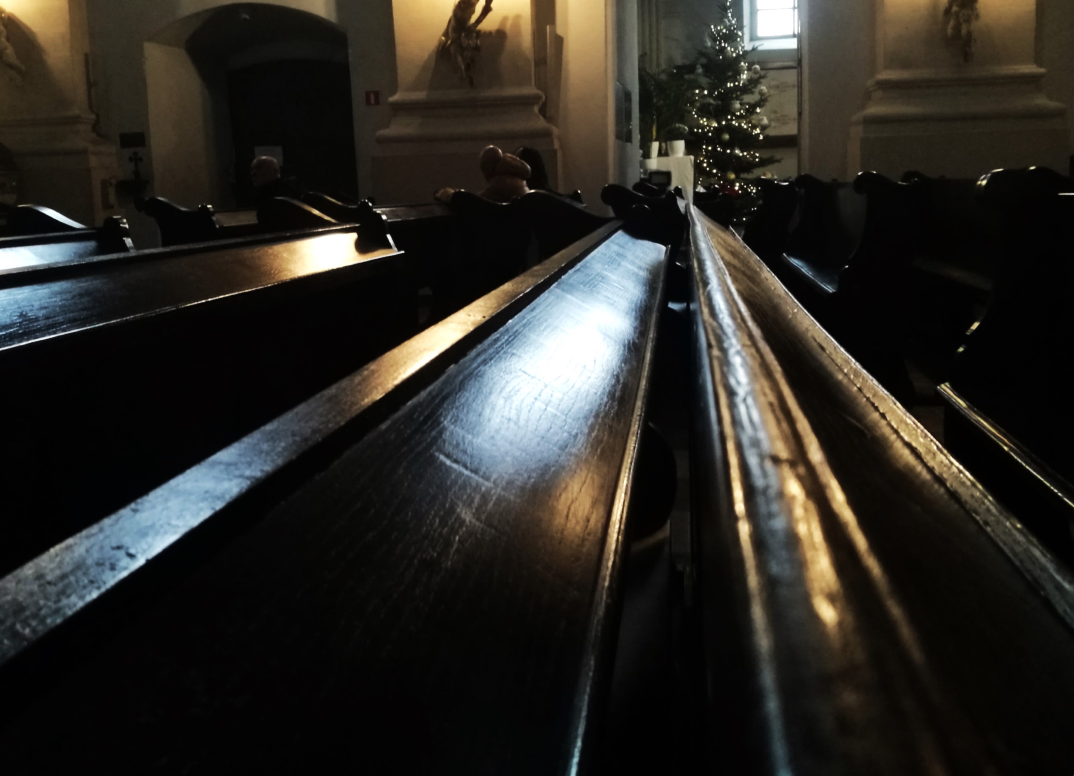 An empty church interior, representing the experience of those who have left religious communities